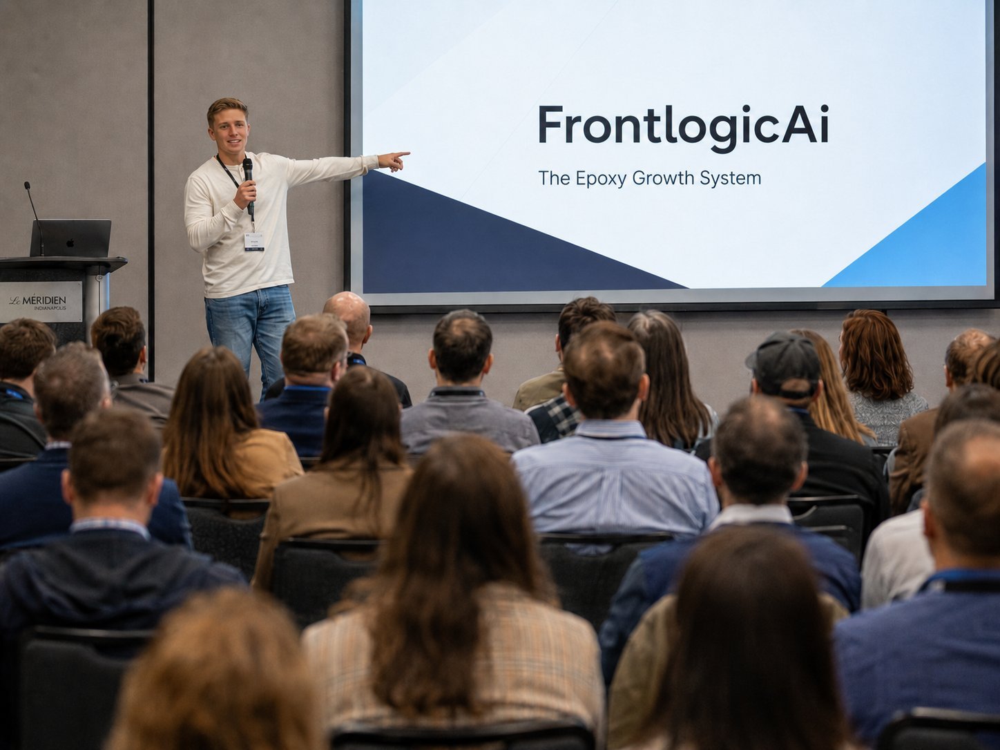 Presenter giving FrontlogicAi product talk to audience in conference room with projection screen